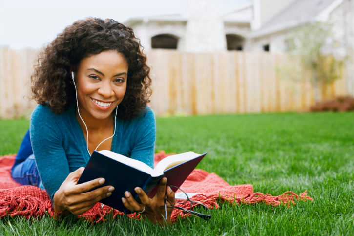 Woman reading outdoors