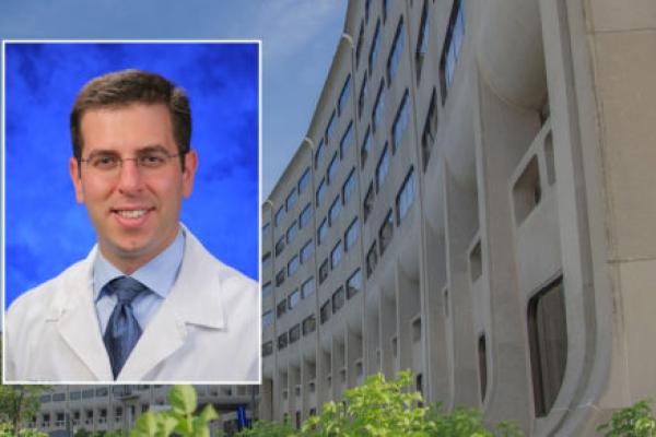 A head and shoulders professional portrait of Dr. Ian Paul against a background image of Penn State College of Medicine.