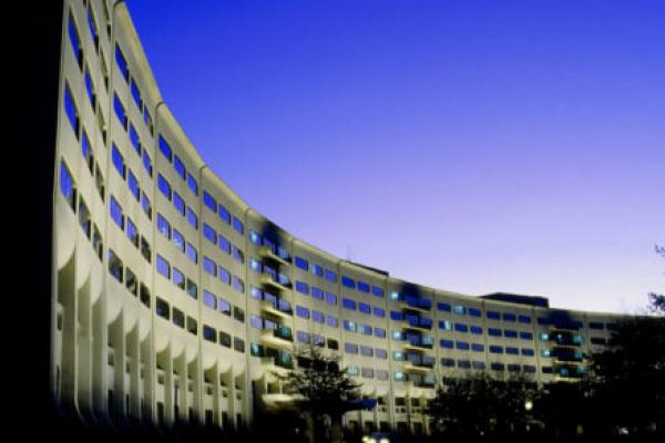 The crescent-shaped façade of Penn State College of Medicine is shown.